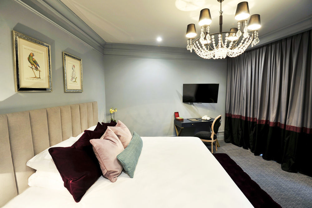 Royal Blue Hotel ดูบรอฟนิก ภายนอก รูปภาพ A bedroom at the hotel